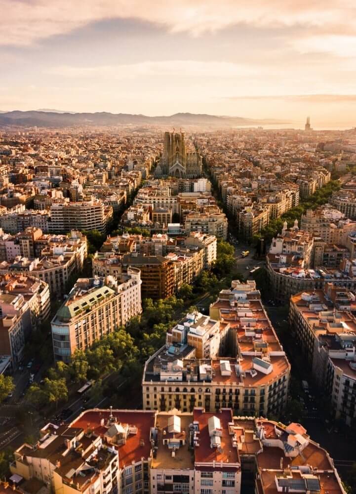 Drone view of the streets of Barcelona at sunset