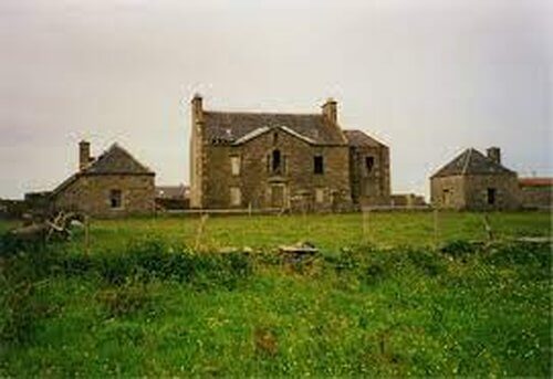 Road Trip Shetland
image Green grass field leading to stone farmhouse in derelict condition ,flanked by 2 other smaller stone building on either side 