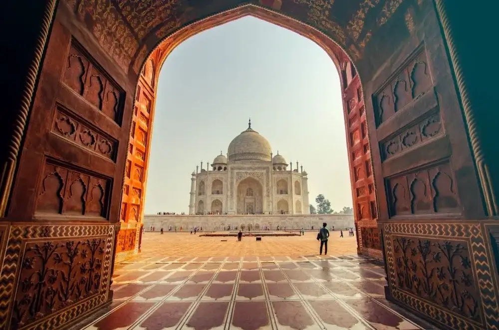 1st solo trip destination Taj Mahal through a carved gateway