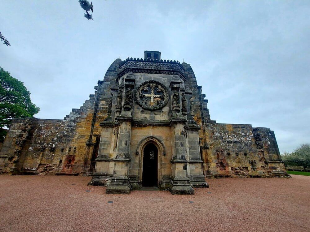 Roslyn Chapel entrance with cross over door