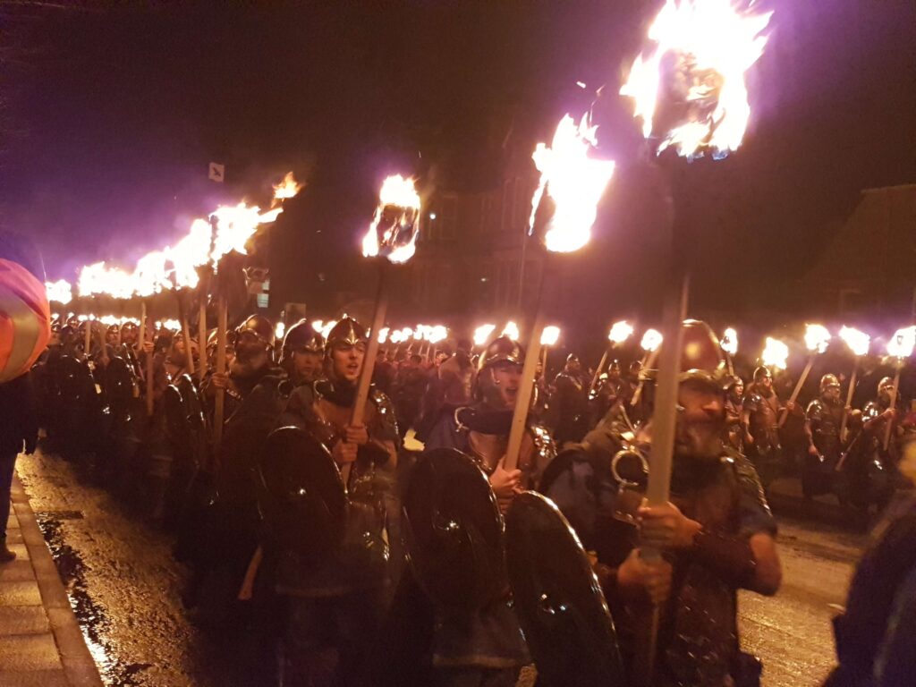 Jarl Squad marching with lit torches