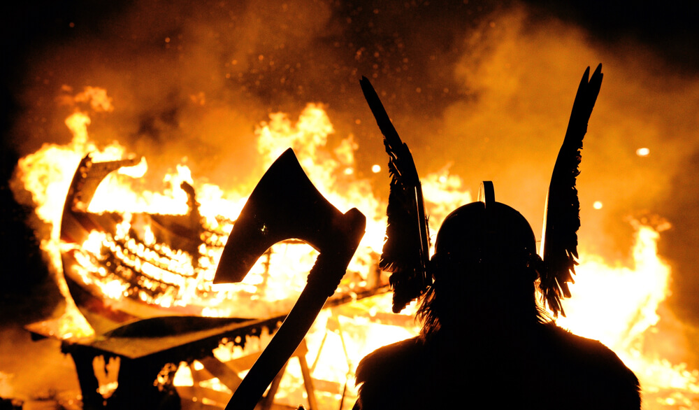 Up Helly Aa Viking with axe in silhouette