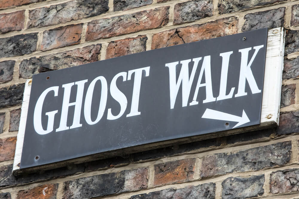 Edinburgh Halloween, ghost walk sign on brick wall