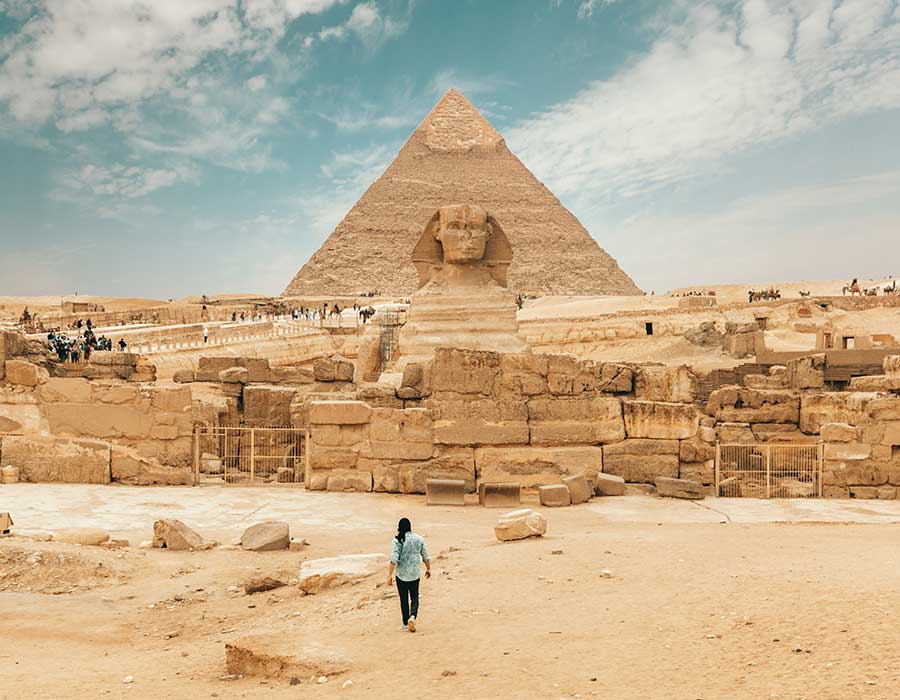 Solo woman exploring the Pyramids in Egypt